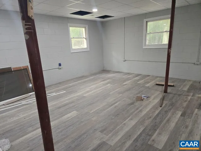a view of an empty room and window