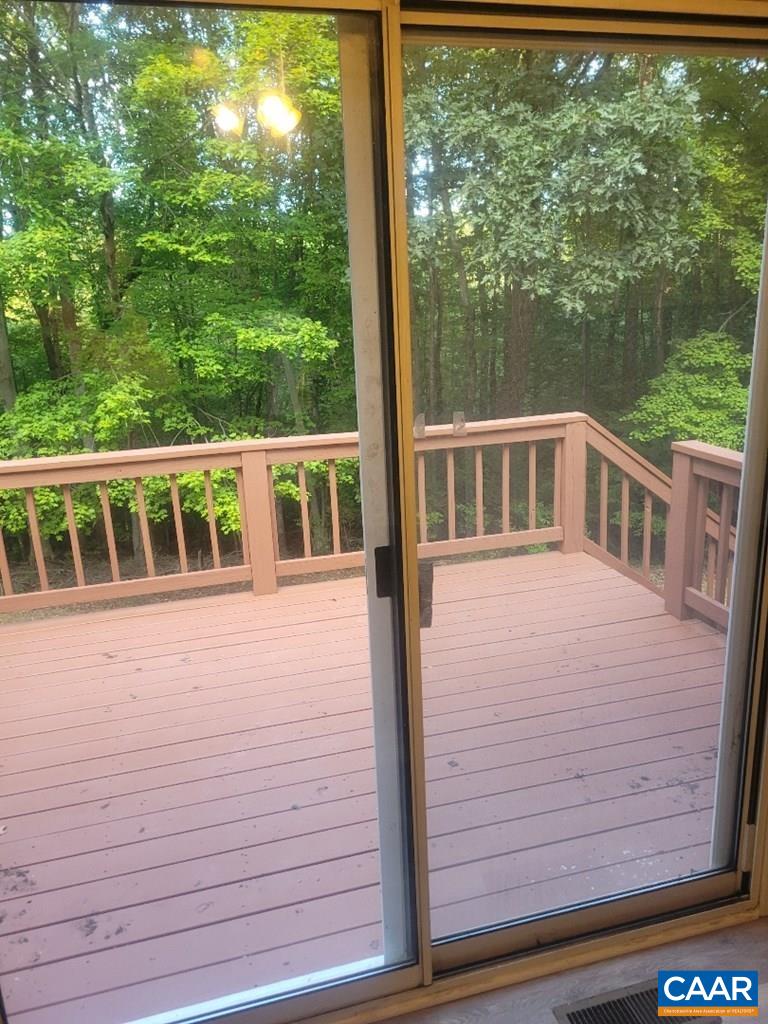 906 Equestrian Trail Road New Canton, VA 23123 - Photo 3 of 22 a balcony view with a large window