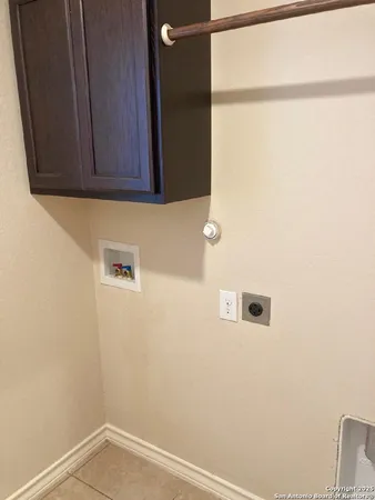 a view of a small space with wooden floor