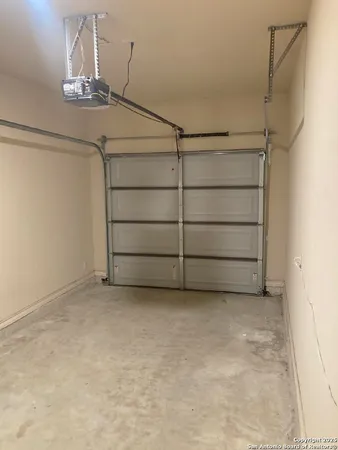a view of a room with storage and racks on the wall