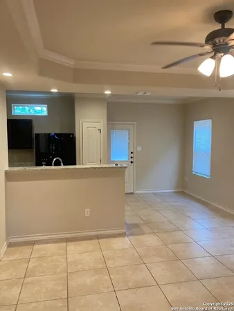 a view of a room with a large window