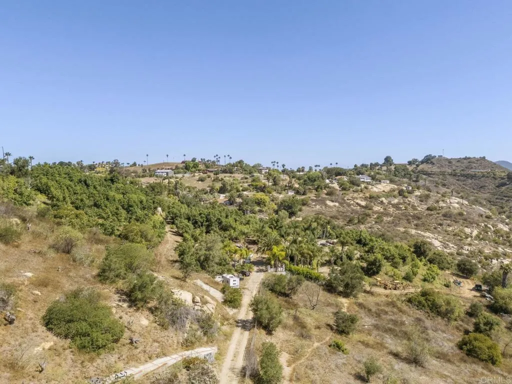0 Brodea Bonsall, CA 92003 - Photo 13 of 17 a view of a large building with a mountain in the background