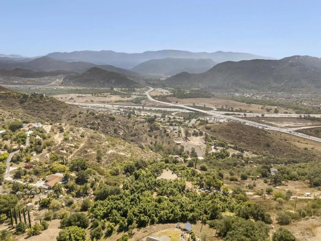 0 Brodea Bonsall, CA 92003 - Photo 8 of 17 a view of a town with mountains in the background