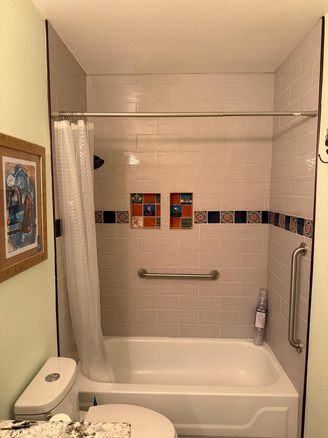 1825 West Ray Road, Unit 1012 Chandler, AZ 85224 - Photo 22 of 34 a bathroom with a shower and a bathtub