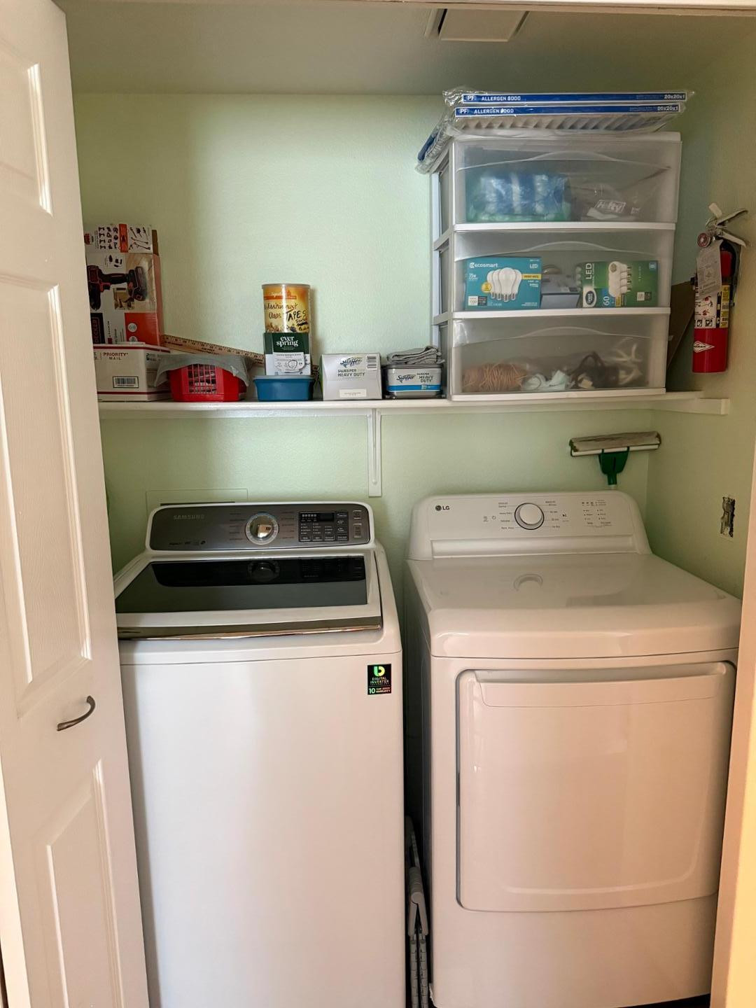 1825 West Ray Road, Unit 1012 Chandler, AZ 85224 - Photo 23 of 34 a utility room with dryer and washer