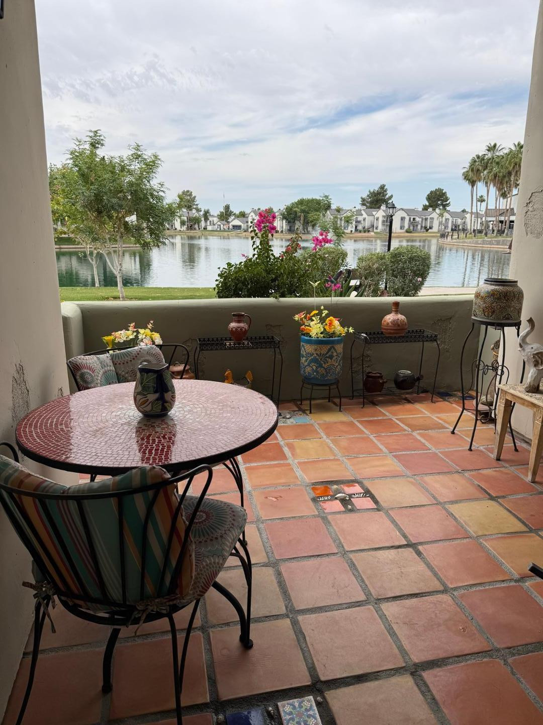1825 West Ray Road, Unit 1012 Chandler, AZ 85224 - Photo 4 of 34 a terrace with outdoor seating and city view