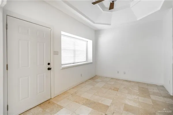 an empty room with windows