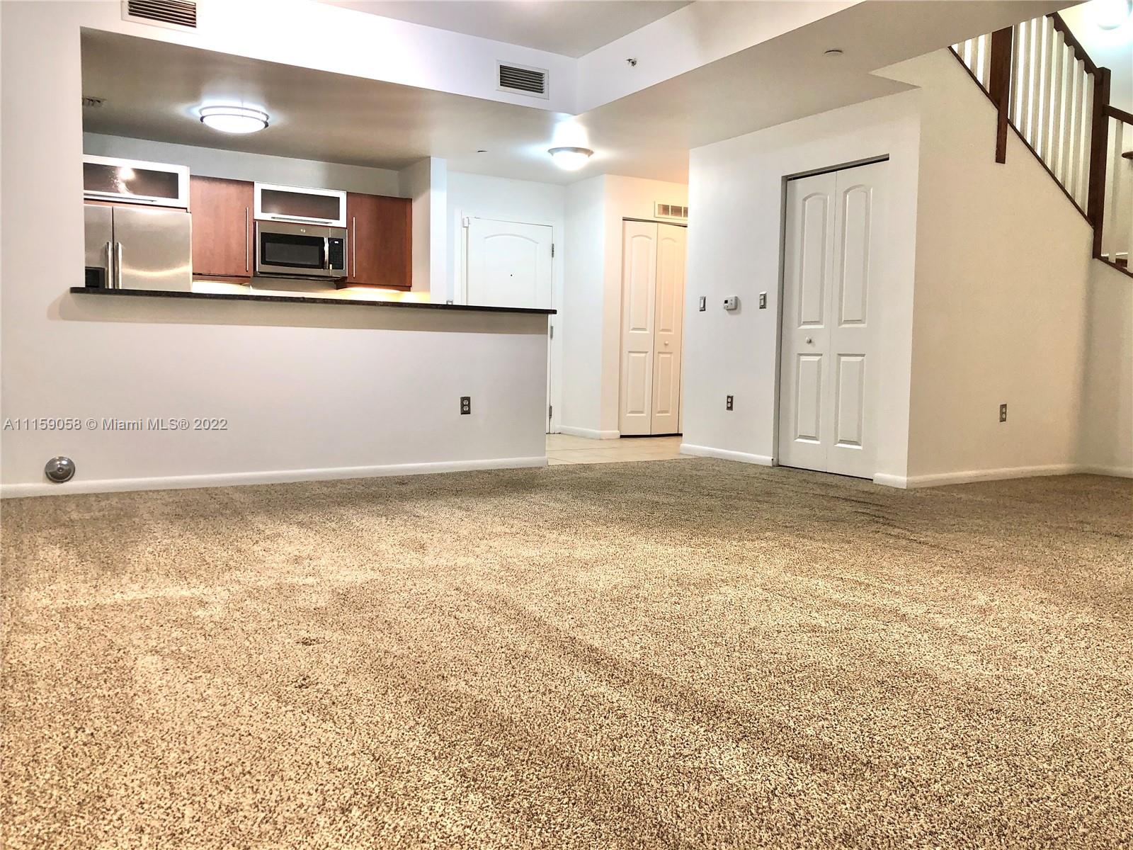 7371 Southwest 90th Street, Unit TH106S Miami, FL 33156 - Photo 8 of 25 a view of an empty room