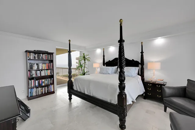 a kitchen with stainless steel appliances kitchen island granite countertop a sink and cabinets
