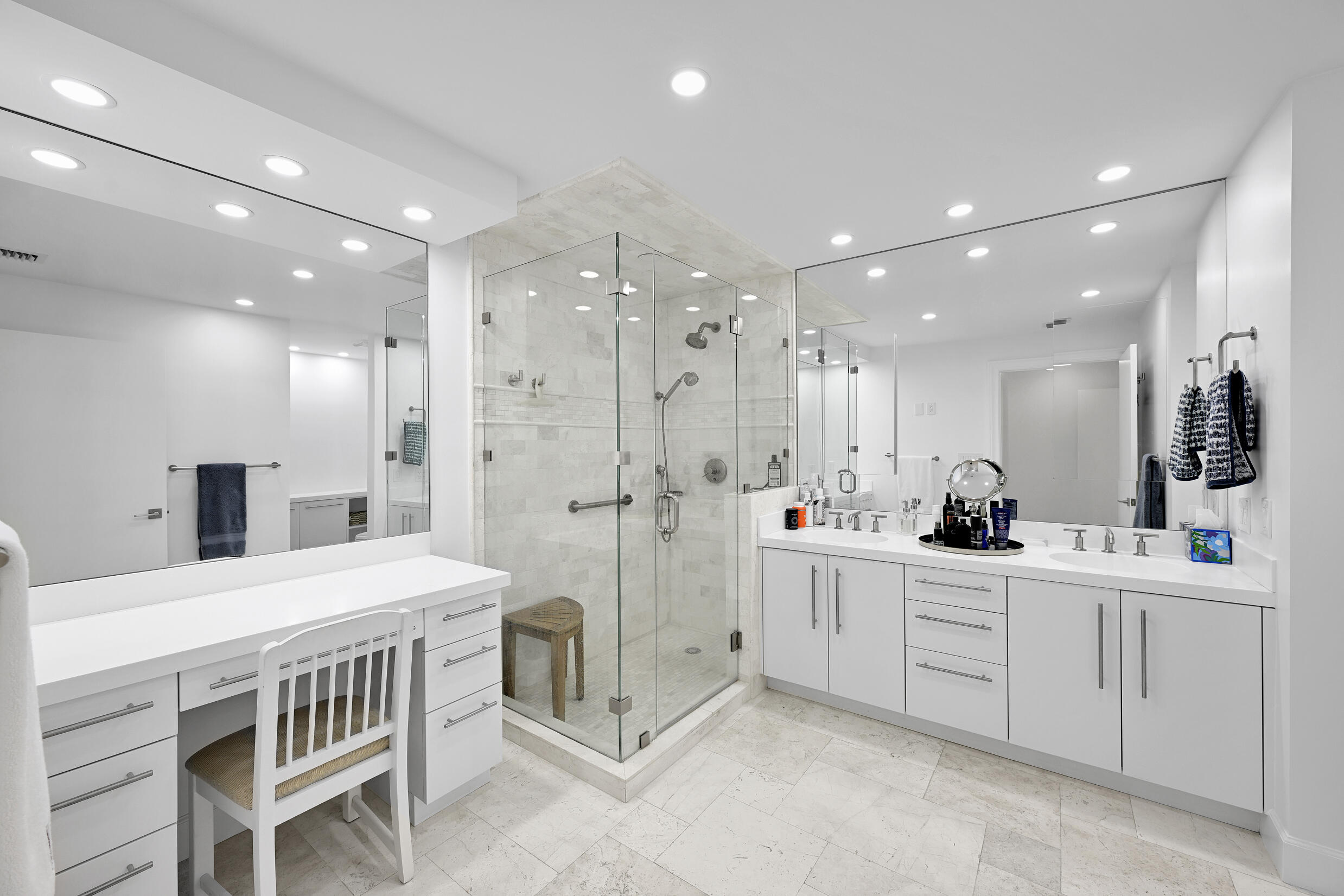 3300 South Ocean Boulevard, Unit 508S Palm Beach, FL 33480 - Photo 12 of 28 a kitchen with stainless steel appliances kitchen island granite countertop a sink and cabinets