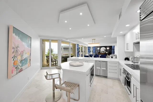 a kitchen with a sink stove and refrigerator