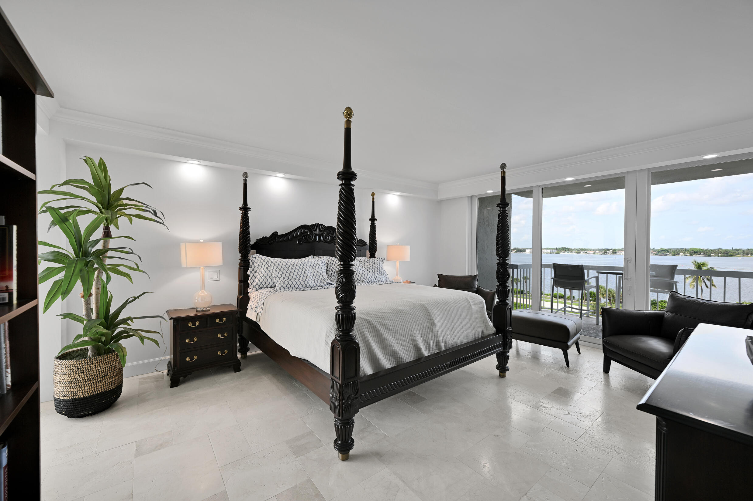 3300 South Ocean Boulevard, Unit 508S Palm Beach, FL 33480 - Photo 10 of 28 a bed room with a bed and a potted plant