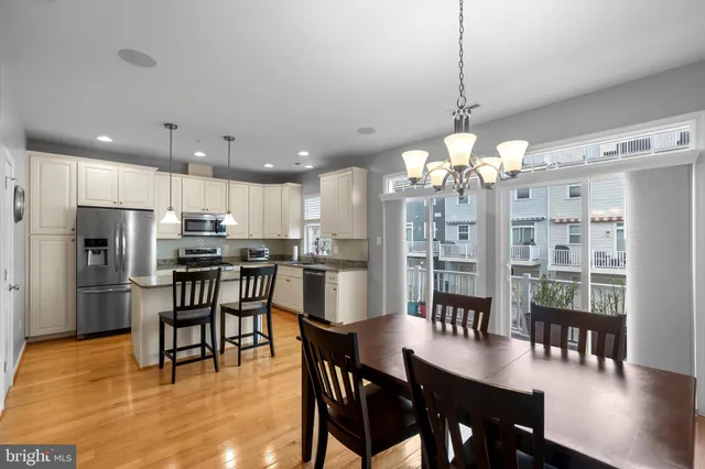 a view of balcony door and wooden floor