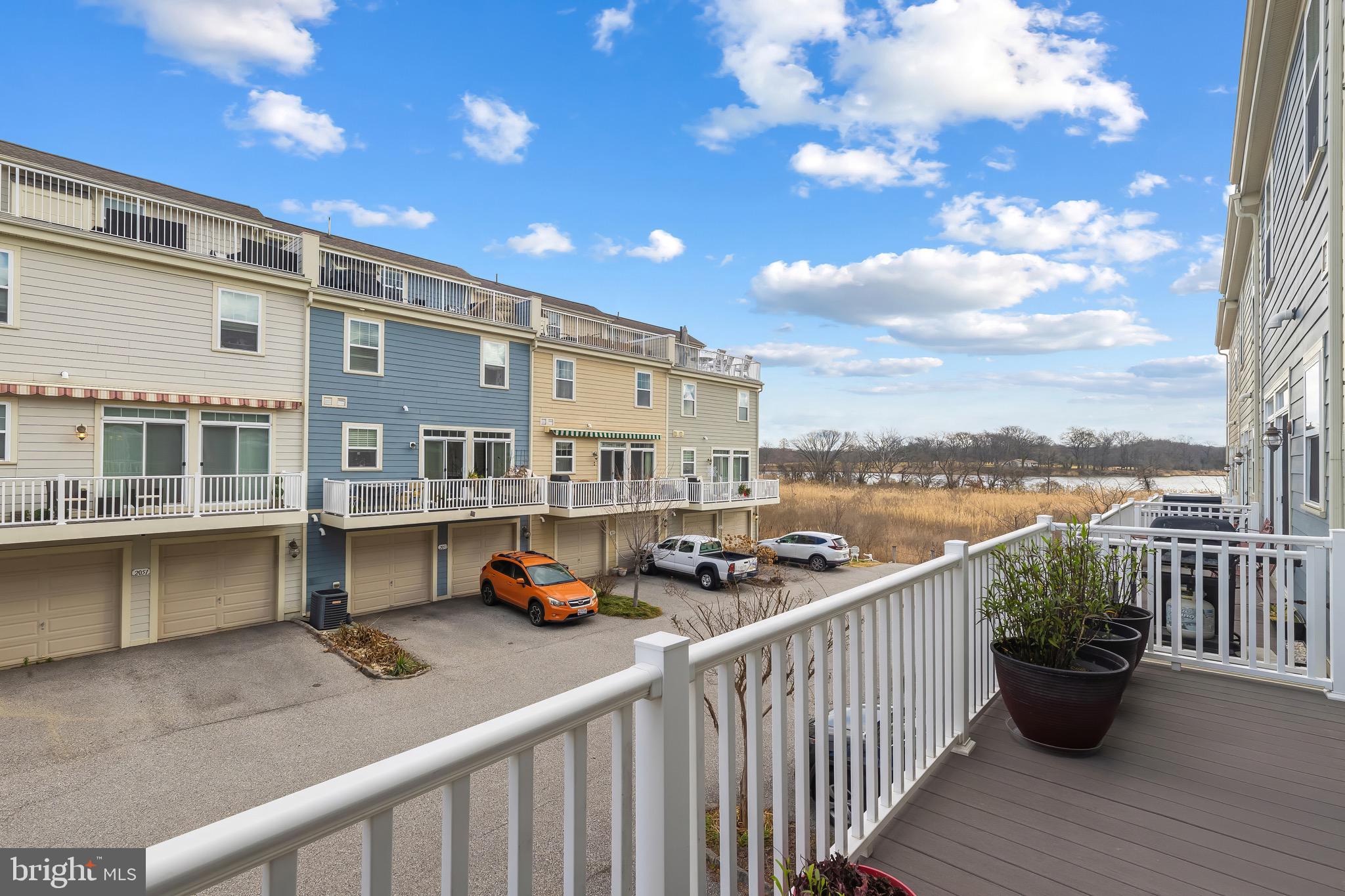 2065 Case Road Baltimore, MD 21222 - Photo 13 of 48 a roof deck with table and chairs