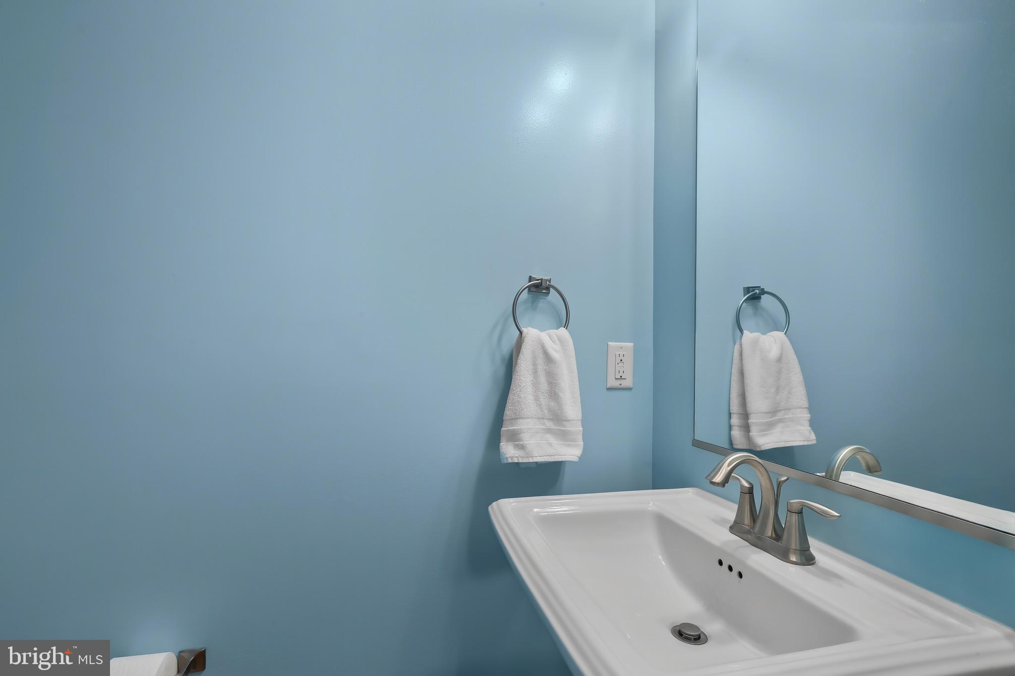 2065 Case Road Baltimore, MD 21222 - Photo 14 of 48 a bathroom with a sink and a mirror