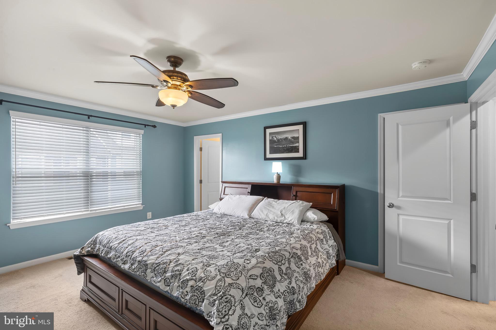 2065 Case Road Baltimore, MD 21222 - Photo 15 of 48 a bedroom with a bed and a chandelier