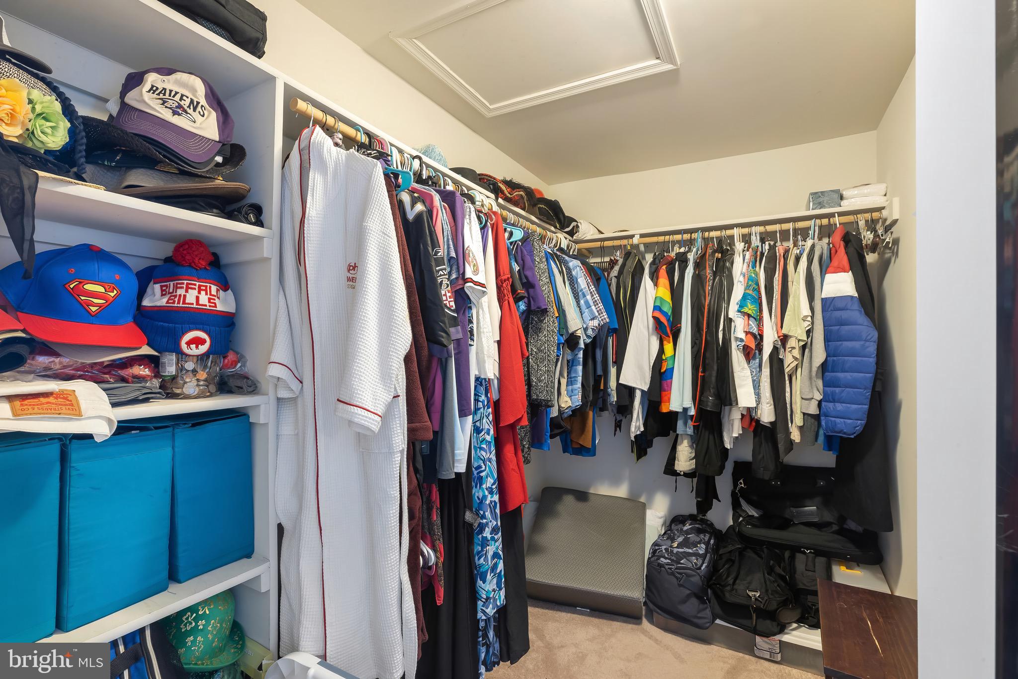 2065 Case Road Baltimore, MD 21222 - Photo 17 of 48 a view of walk in closet with clothes and shoes