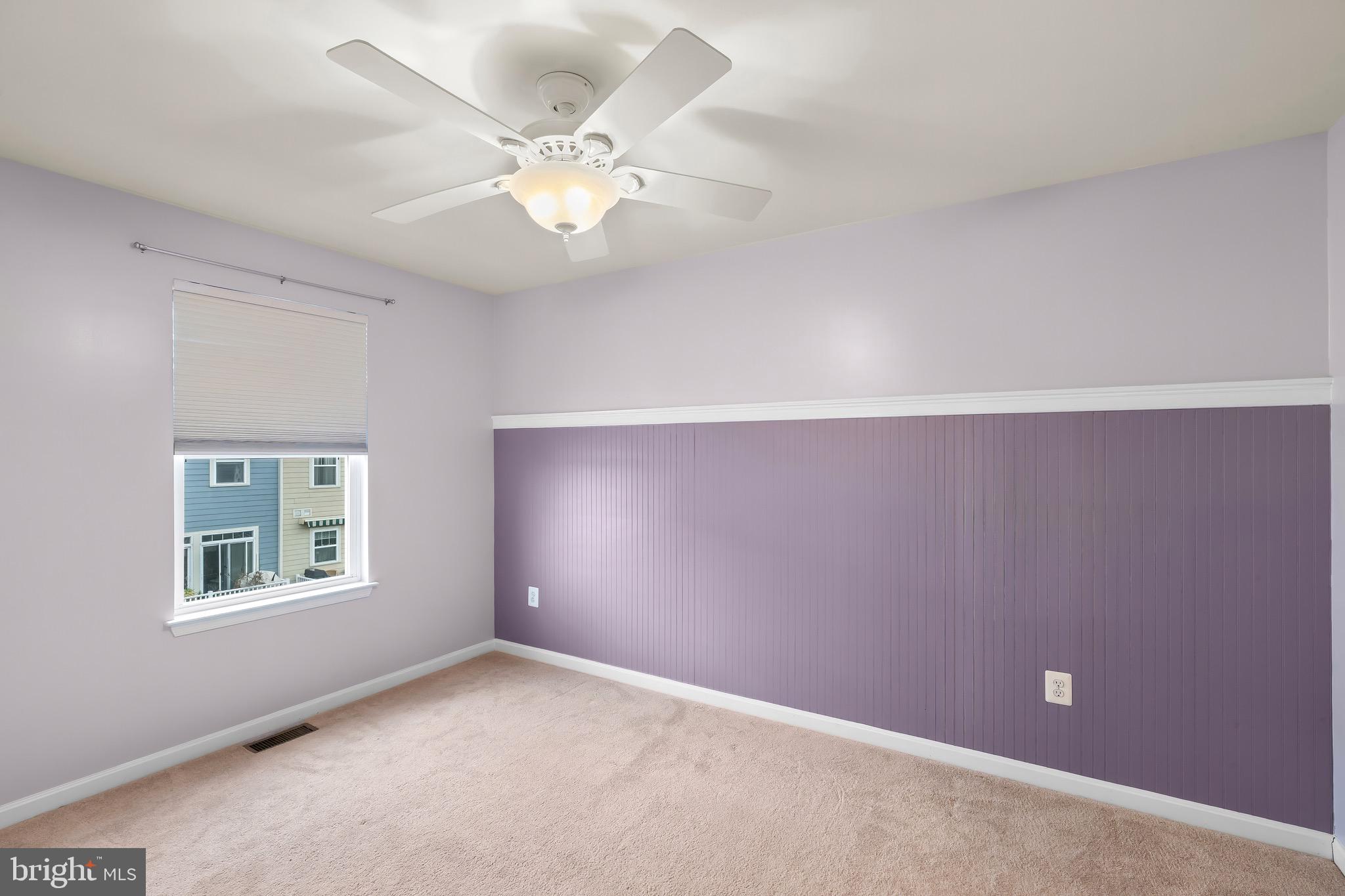 2065 Case Road Baltimore, MD 21222 - Photo 25 of 48 an empty room with windows and fan
