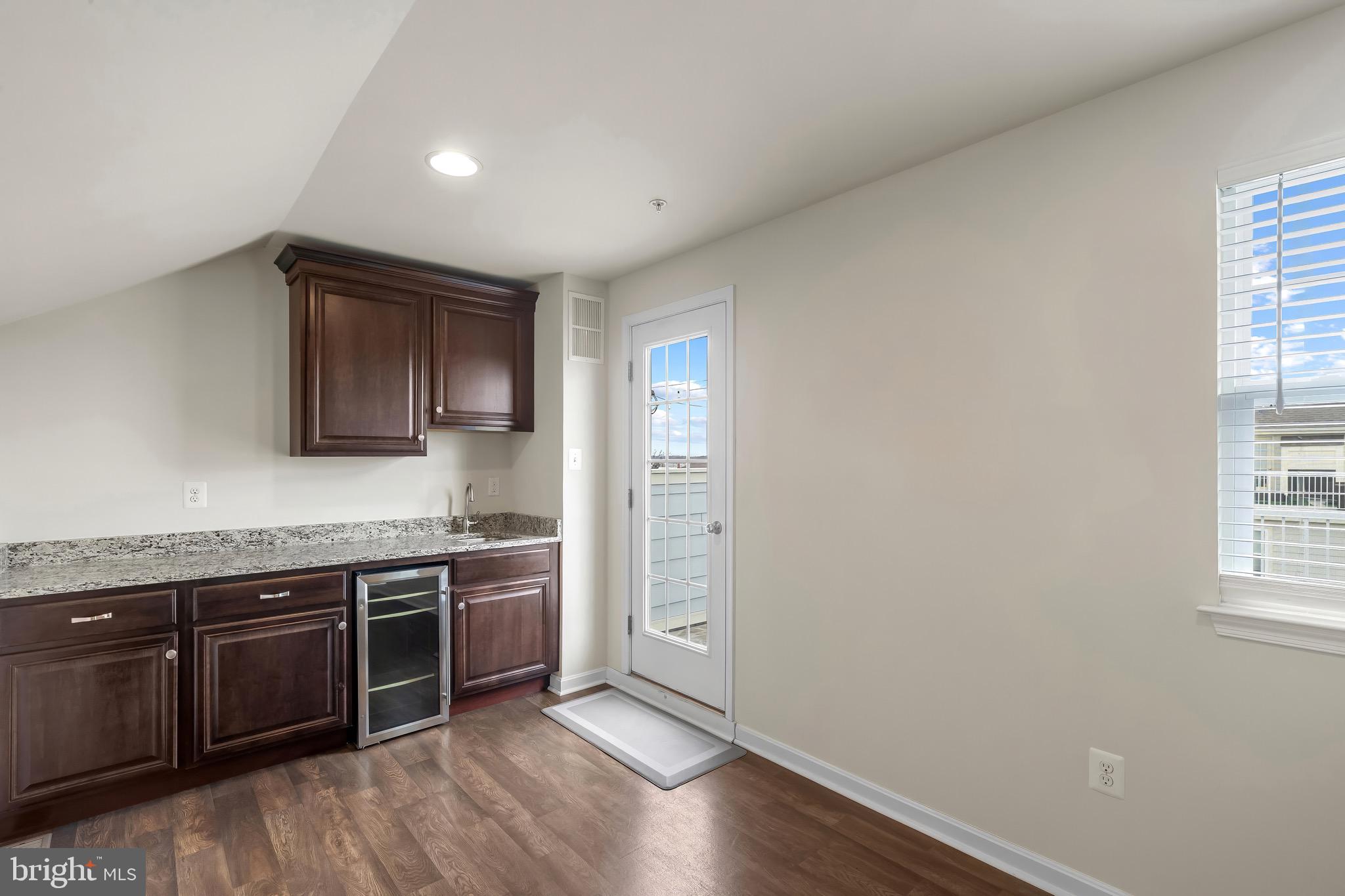 2065 Case Road Baltimore, MD 21222 - Photo 27 of 48 a kitchen with stainless steel appliances granite countertop a stove and a sink