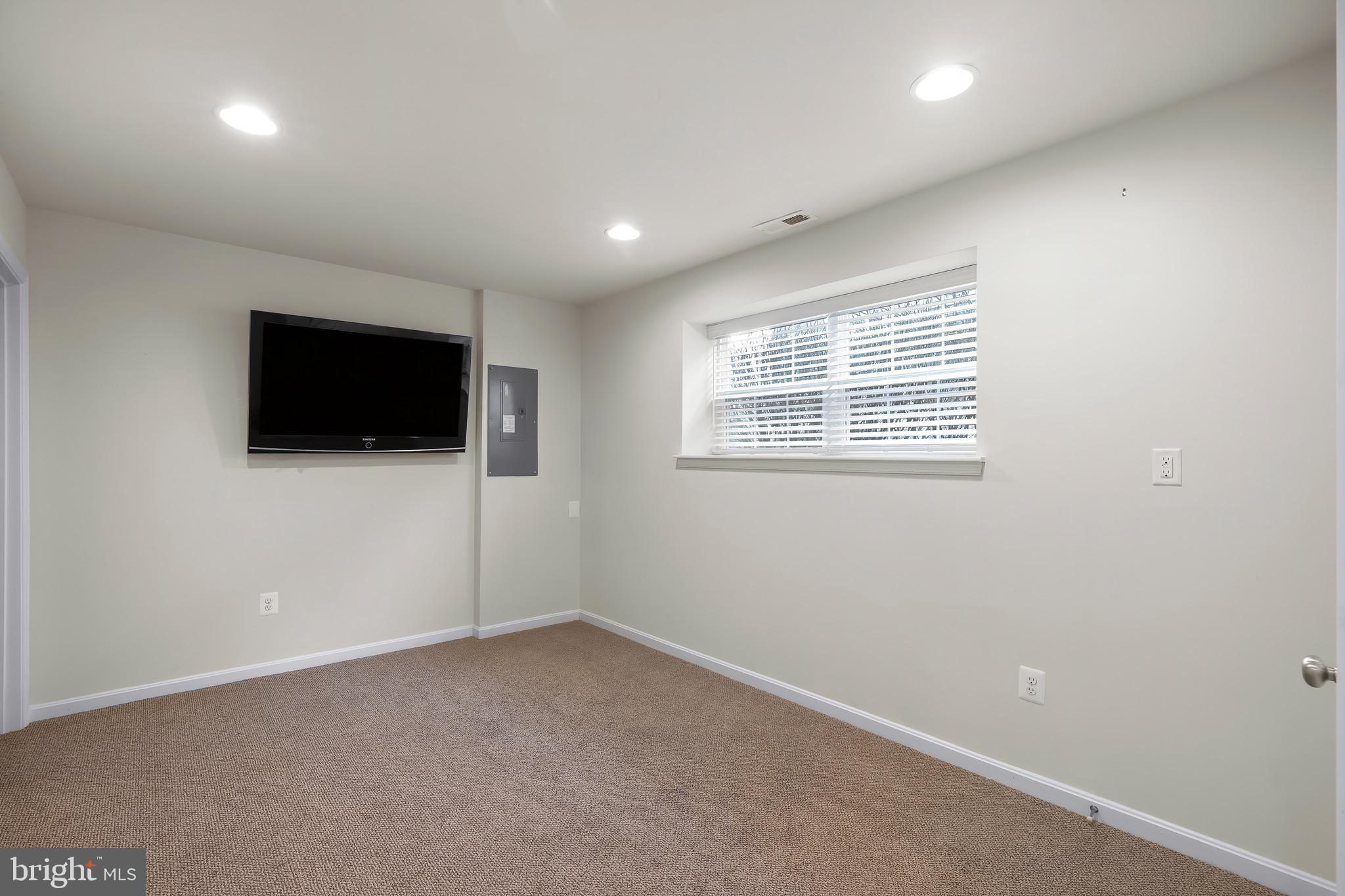 2065 Case Road Baltimore, MD 21222 - Photo 32 of 48 a view of a livingroom with a flat screen tv