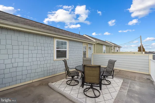 a view of a wrought iron fences in front of house