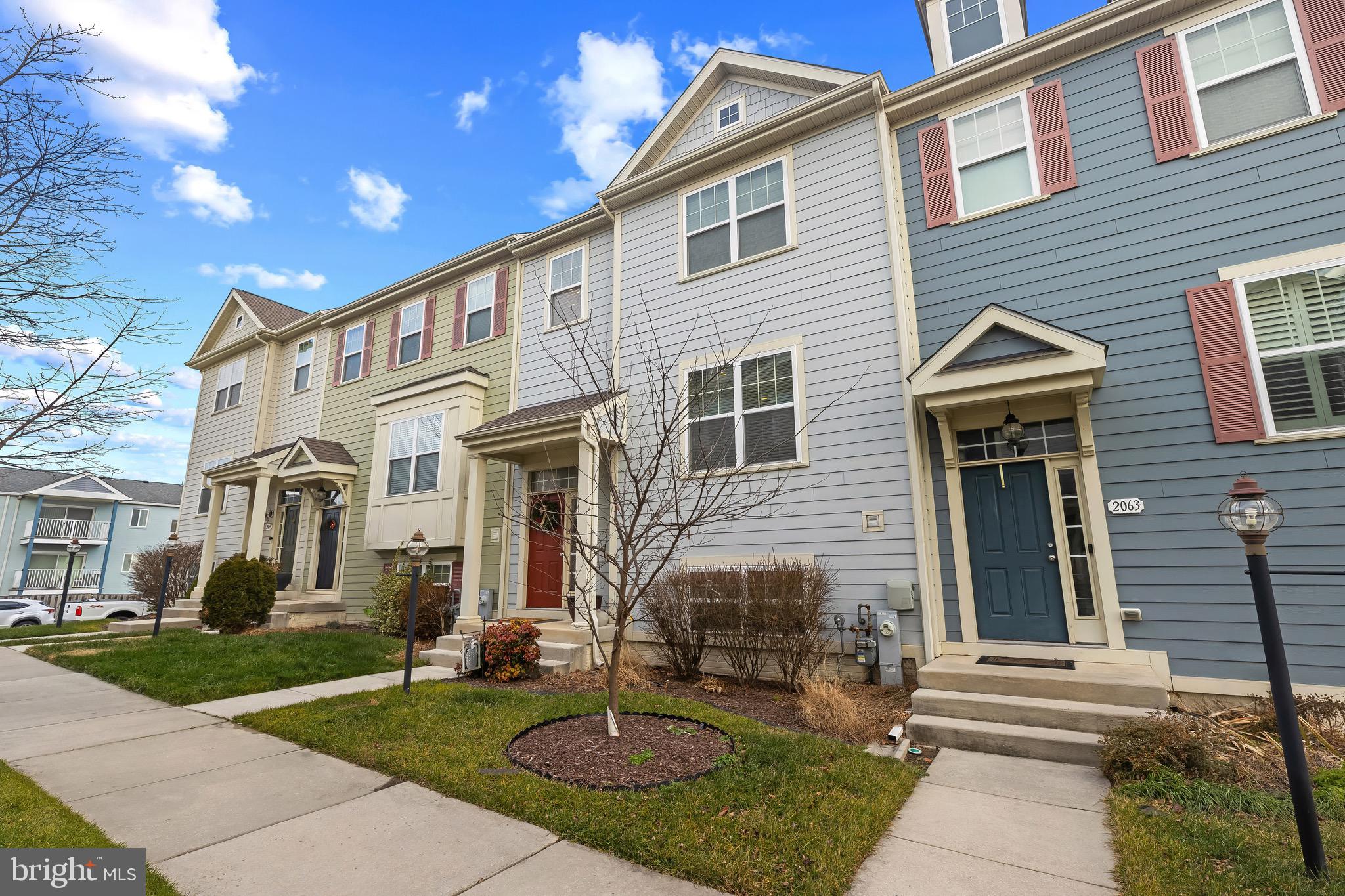 2065 Case Road Baltimore, MD 21222 - Photo 36 of 48 a front view of a house with garden
