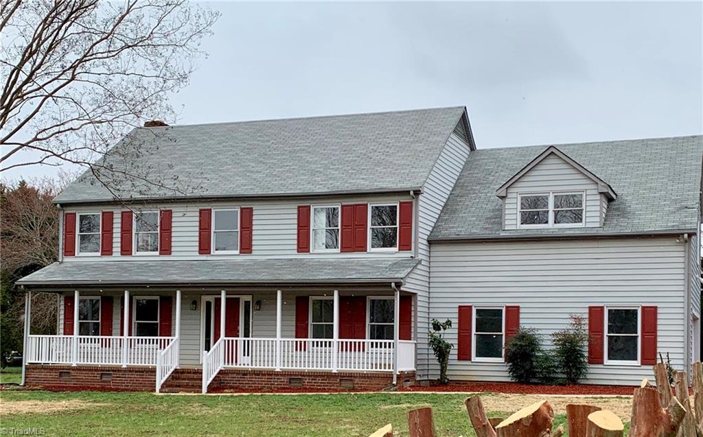 7517 Strawberry Road Summerfield, NC 27358 - Photo 1 of 45 FRONT EXTERIOR