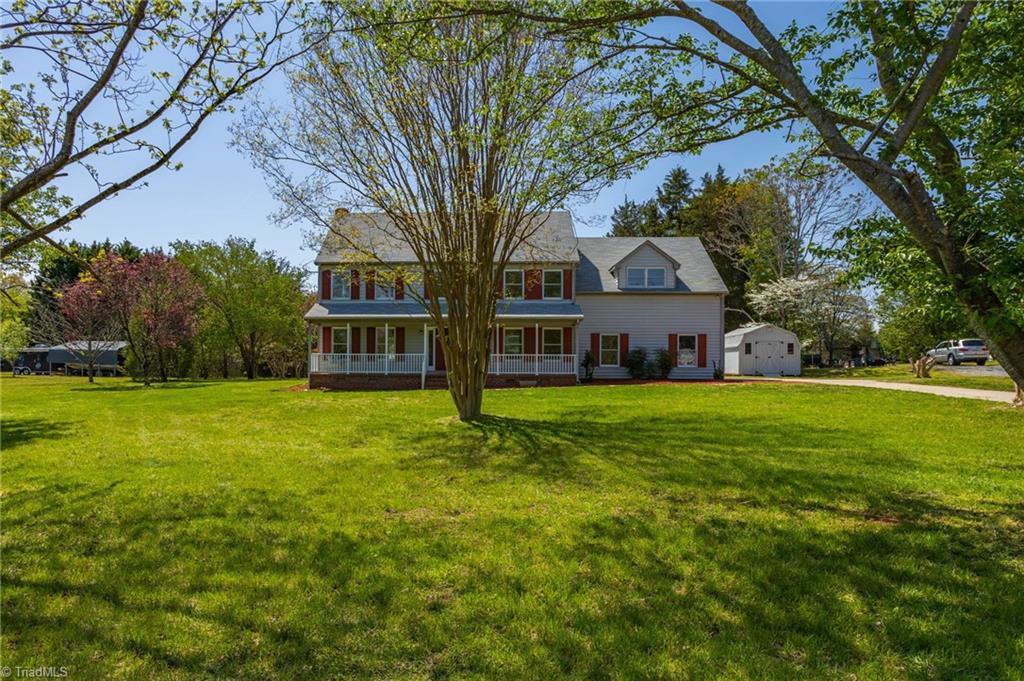 7517 Strawberry Road Summerfield, NC 27358 - Photo 4 of 45 FRONT EXTERIOR