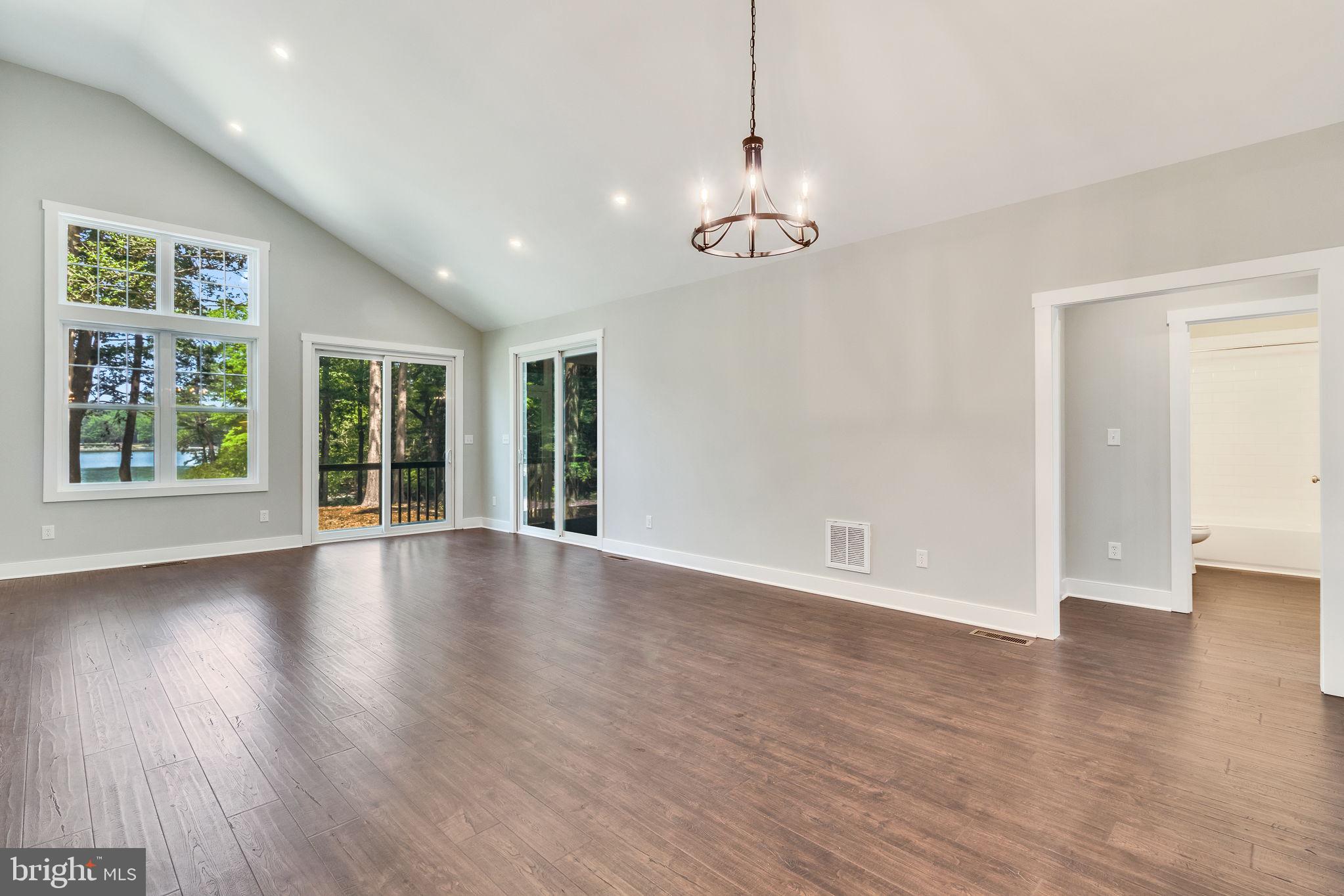 57 Waterman's Way Reedville, VA 22539 - Photo 14 of 43 Great Room lots of natural light, view to water