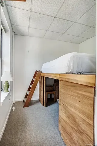 a black and white photo of a living room