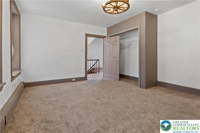 a bathroom with a bathtub a sink and a shower