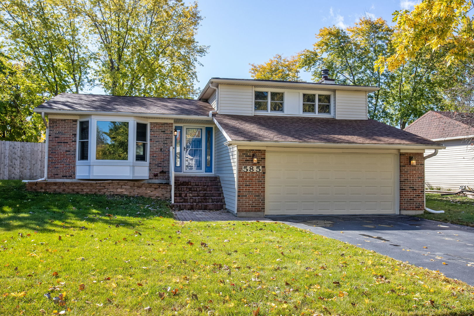 585 Cambridge Way Bolingbrook, IL 60440 - Photo 1 of 20 a view of a house with a yard