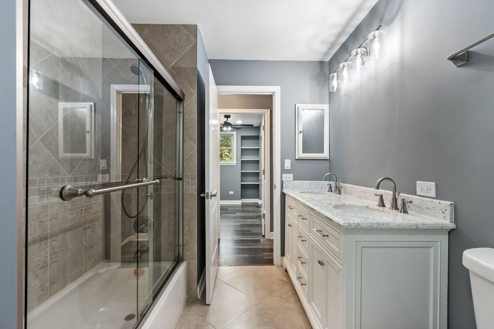 585 Cambridge Way Bolingbrook, IL 60440 - Photo 12 of 20 a bathroom with a granite countertop sink mirror and shower