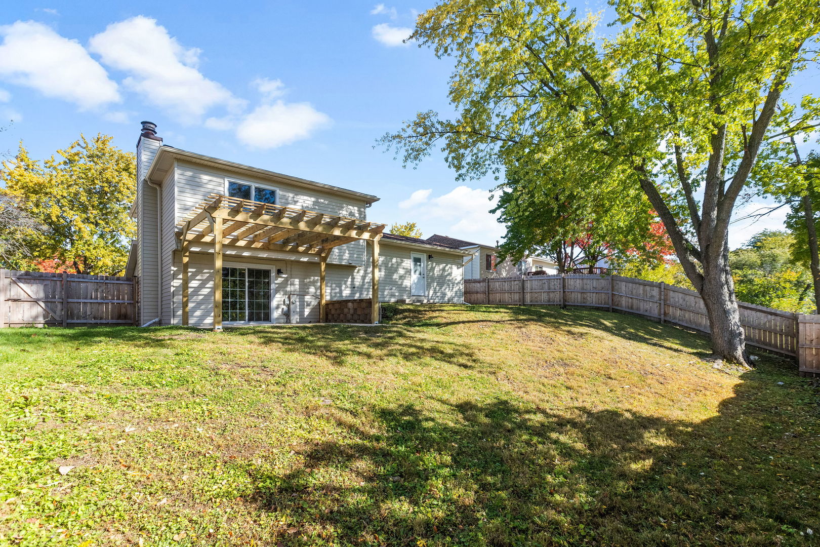 585 Cambridge Way Bolingbrook, IL 60440 - Photo 19 of 20 a swimming pool with outdoor seating and yard