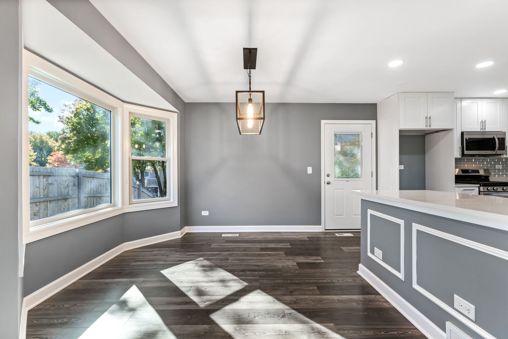 585 Cambridge Way Bolingbrook, IL 60440 - Photo 7 of 20 a view of a kitchen with sink and windows