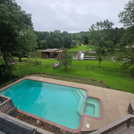 $749,900 | 560 Lake Grove Drive, Coldspring, TX 77331