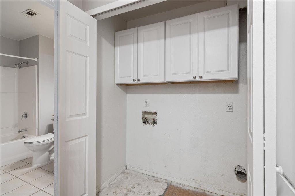 1748 Ohlen Road, Unit 76 Austin, TX 78757 - Photo 24 of 34 a view of bathroom with toilet