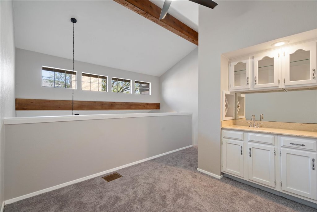1748 Ohlen Road, Unit 76 Austin, TX 78757 - Photo 25 of 34 a view of a kitchen with a sink