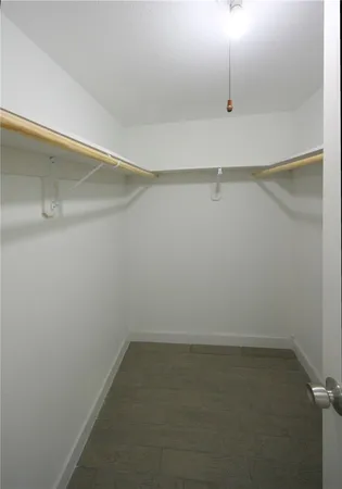 a view of a room with racks on the wall