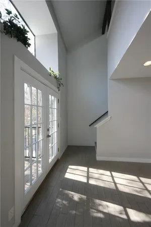 a view of an empty room with windows