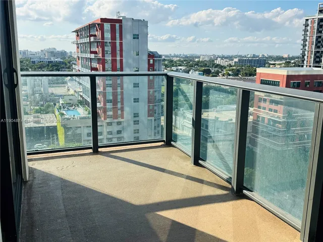 a view of a city with tall buildings