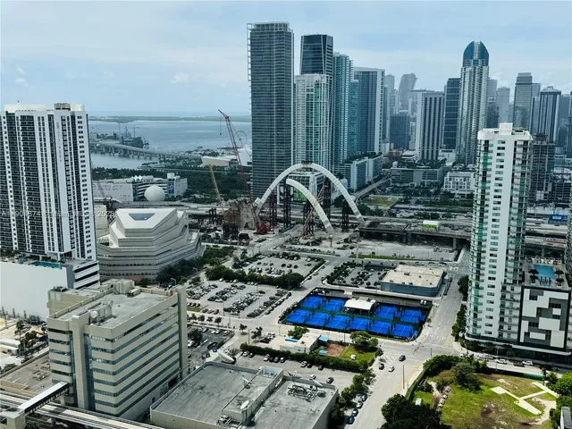 a view of a balcony with two chairs and a table