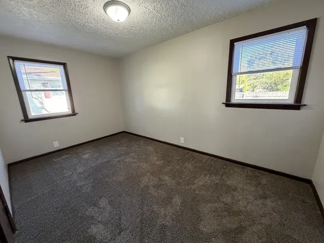 an empty room with a workbench