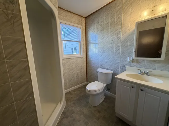 a bathroom with a sink and a toilet