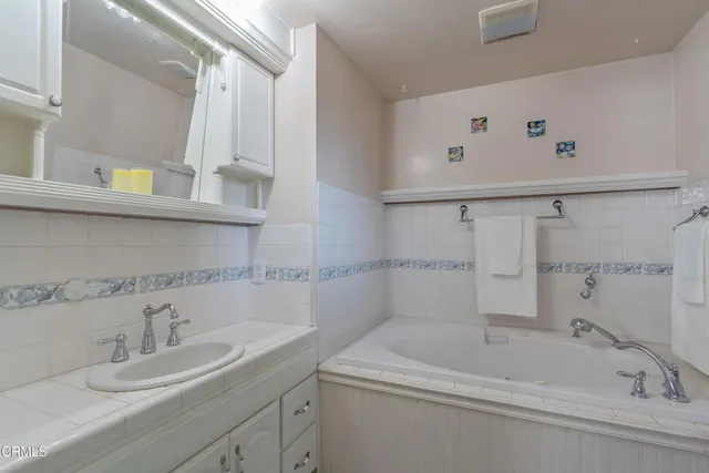 a bathroom with a sink and a bathtub