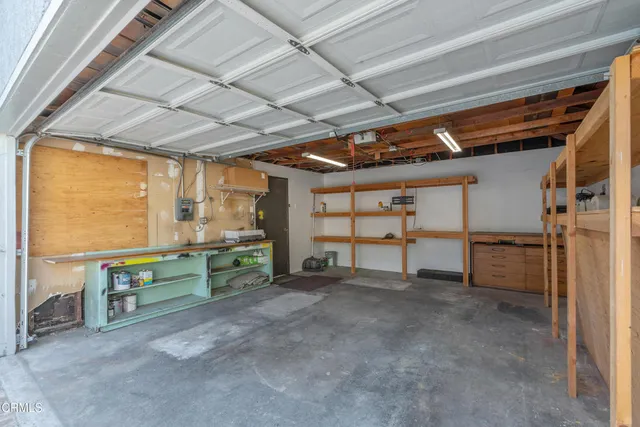 a view of a garage room with an empty room