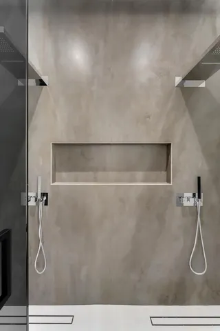 a living room with a bed furniture and a window