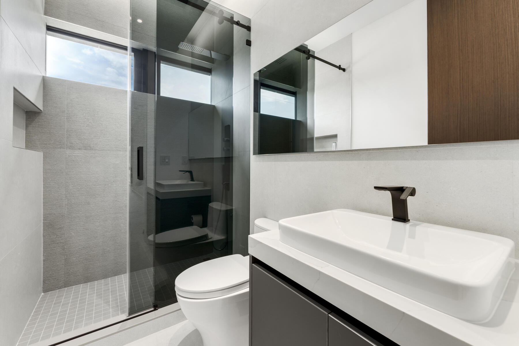 64 Andros Road Key Largo, FL 33037 - Photo 28 of 62 a bathroom with a sink a toilet and shower
