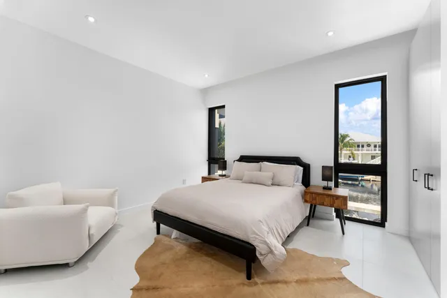 a room with a bed and a window