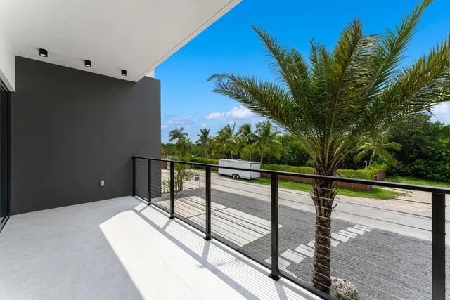 a view of swimming pool with outdoor seating and plants